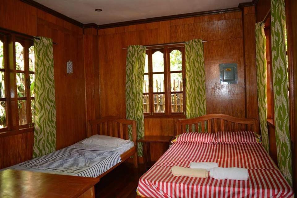 Nellie'S Tourist Inn- Port Barton San Vicente  Dış mekan fotoğraf